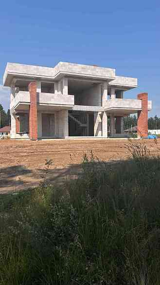 Каменный дом по индивидуальному проекту с плоской кровлей