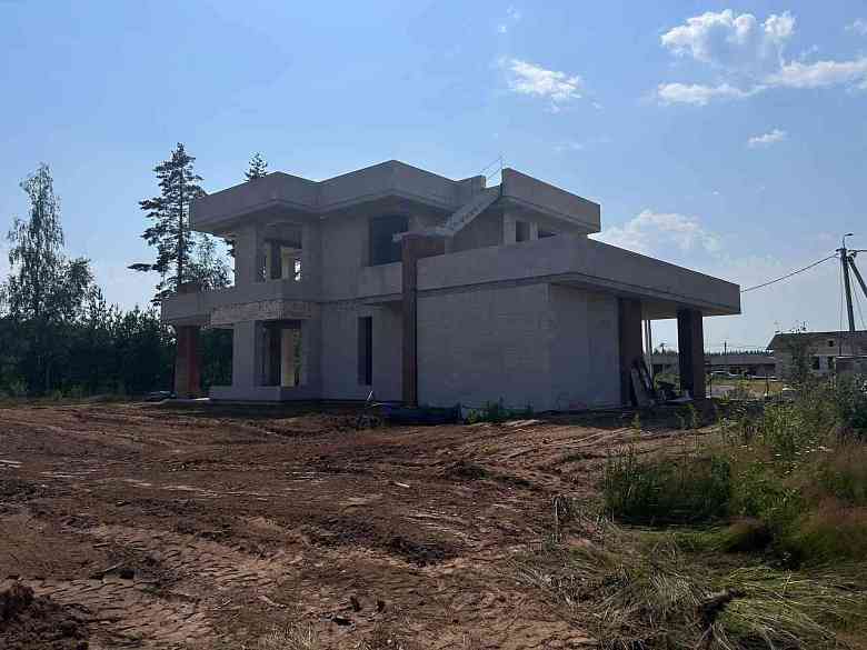 Каменный дом по индивидуальному проекту с плоской кровлей